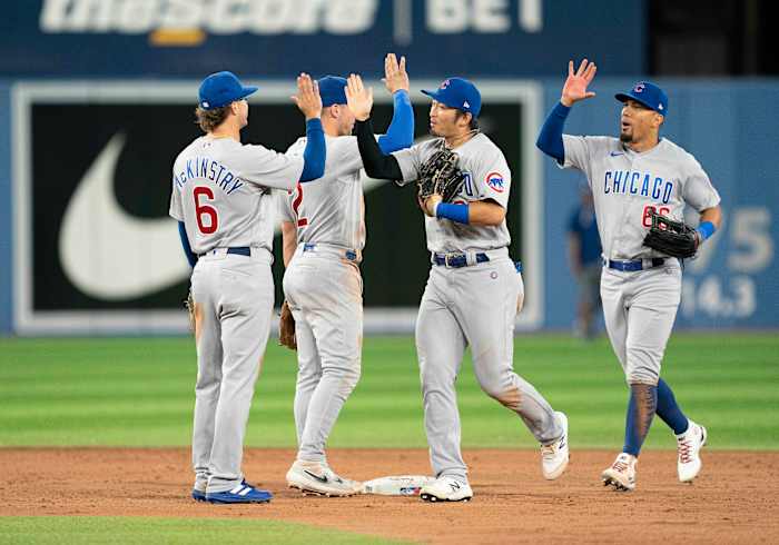 The Chicago Cubs celebrate their Wednesday night win against the Toronto Blue Jays. 